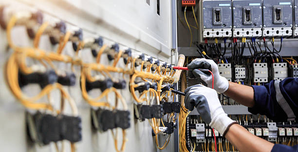 Professional Electrician technician working in Overland, MO
